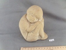 Statuette en pierre jeune