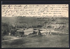 CPA Saint-Laurent-les-Bains, La Trappe avec vue sur le monastère entouré de for 