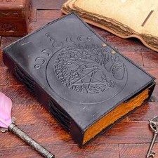 Livre d'ombre en cuir journal