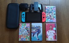 Nintendo Switch + 8 Jeux
