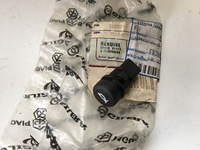 UN BOUTON ORIGINE 58058R DE