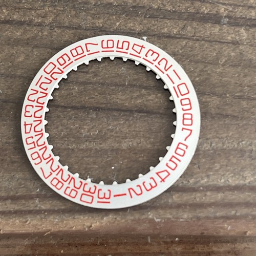 Disque quantième montre - de,