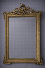 Miroir doré ancien à fronton