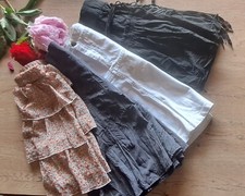 Lot N° 13 : X 4 jupes d'été, mi longue, fluide, jean. Taille 36.