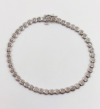 Bracelet tennis vintage or blanc 9k et diamants