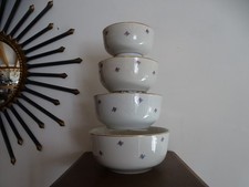 Lot de 4 saladiers gigogne en faience de Luneville décor floréal . Top vintage