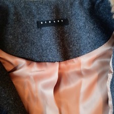 Manteau laine faux astrakan