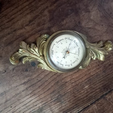 baromètre SFAM doré a la