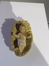 Ancien santon "petit jésus" en cire dans son berceau modèle déposé