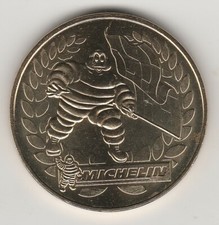 A 2009 TOKEN MEDAILLE SOUVENIR MDP -- 63 000 N°8 MICHELIN BIBENDUM LE DRAPEAU