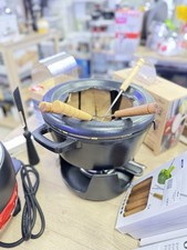 Service. A Fondue 8 Personnes