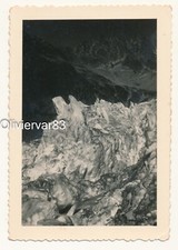 Vintage artistic photo nice contrast - glacier w dark mountain in the background