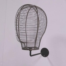 Présentoir mural pour tête