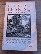 Signe sur les mains - le,