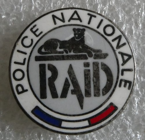Police pin raid - pin,