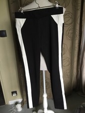 MAGNIFIQUE PANTALON LEGGING CALZEDONIA T S BICOLORE NOIR BLANC SIMILI CUIR