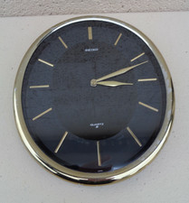 Vintage Quartz horloge murale ovale rétro des années 1980 argent/noir