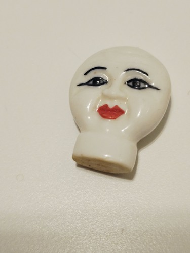 Figurine tête céramique - en,