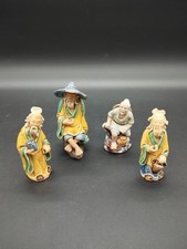 Lot de 4 figurines chinoises