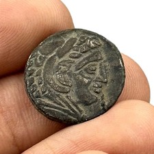 Véritable ancienne pièce de monnaie romaine en bronze visage d'empereur