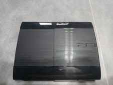 PS3 slim 500go noire avec 1 manette et 23  jeux