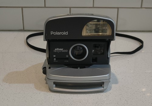 Polaroid 600 one - one, step