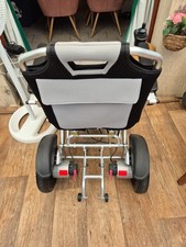 Un Fauteuil Électrique Pour