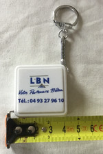 Ancien porte clé mètre ruban