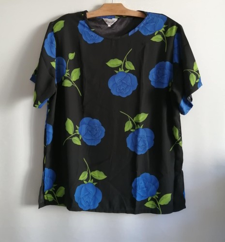 Blouse noire fleurs - à,
