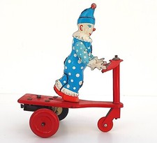 CLOWN SUR TROTTINETTE TRICYCLE   ROLI ZOLI HONGRIE ANCIEN JOUET MÉCANIQUE À CLEF