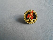 Pin's BD Fusée TINTIN - AMT agence conseil en communication