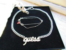 parure guess collier+bracelet parfait état,absente mais ai avec moi