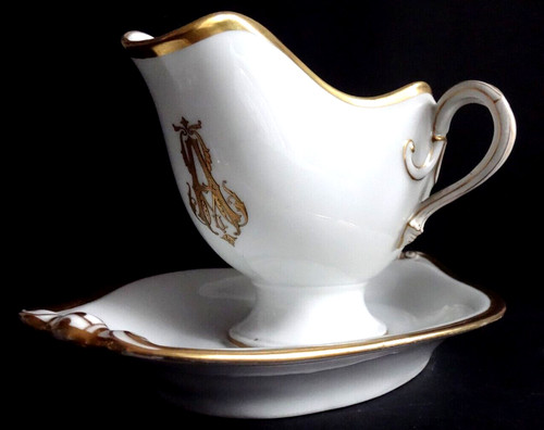 Ancienne sauciére porcelaine