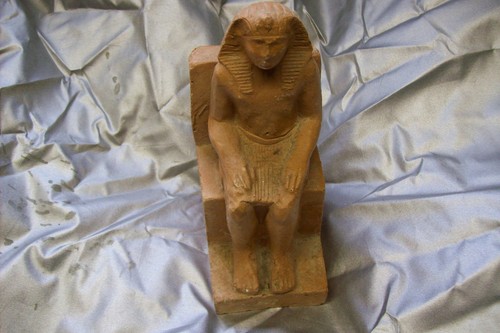 Statuette article sculpté - un,