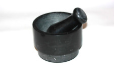 Mortier et pilon en marbre noir