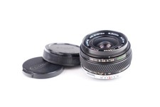 Objectif Olympus OM - System Auto - W f/2,8 - 35mm #213198. Avec bouchons.