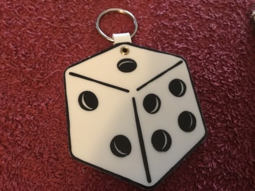 Rubber die key chain - die,