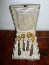 Couverts de service à dessert en métal argenté