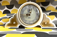 Réveil Art Déco SMI Paris en bakelite couleur crème et or