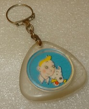 PORTE CLE PORTE CLEFS PUB JOURNAL TINTIN ET MILOU, JEU A BILLES