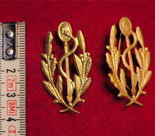 2 insignes de col caducée