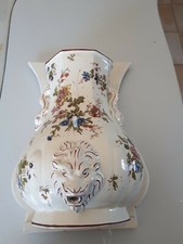 Fontaine murale en faience sur support bois à tête de Lions avec dauphins 