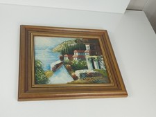 Tableau "Paysage romantique aux toits colorés"