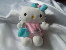 Doudou, peluche Hello Kitty robe rose, sac et noeud bleu SANRIO JEMINI