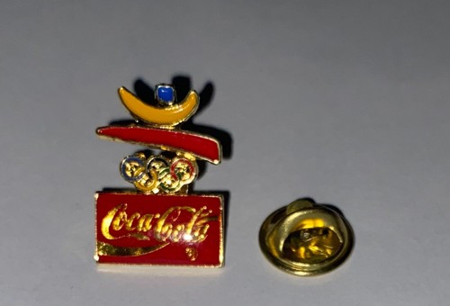 Pin coca cola jeux - pin's,