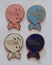 lot 4 pins differents telethon vetement jacadi