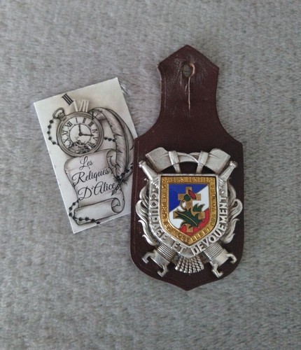 Insigne pucelle sapeur pompier - insigne/pucelle,
