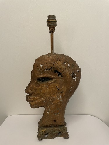 Pied lampe artiste visage - de,