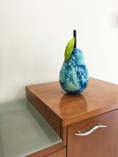 Blue pear sculptures hand - pear,