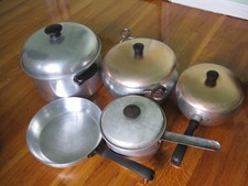 WEAR-EVER COOKING POTS TOTALLY 9 PIESES BUT ONE HEAVY GAUGE OF THE BIGGER